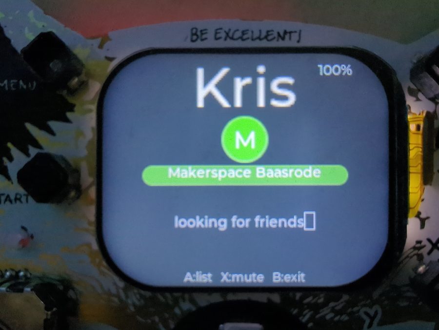 The name tag screen running on a 2024 badge