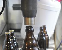Pillar drill bottle capper